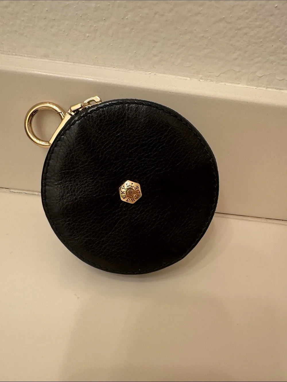 Round Black Leather Coin Pouch with Gold Hardware